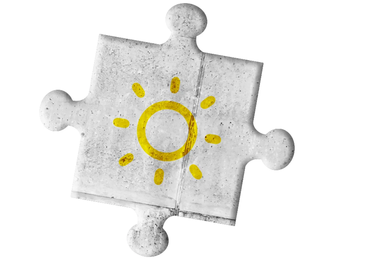 Sonne auf grauem Puzzleteil