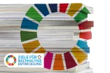 Bücherstapel mit Aufschrift UN Nachhaltigkeitsziele